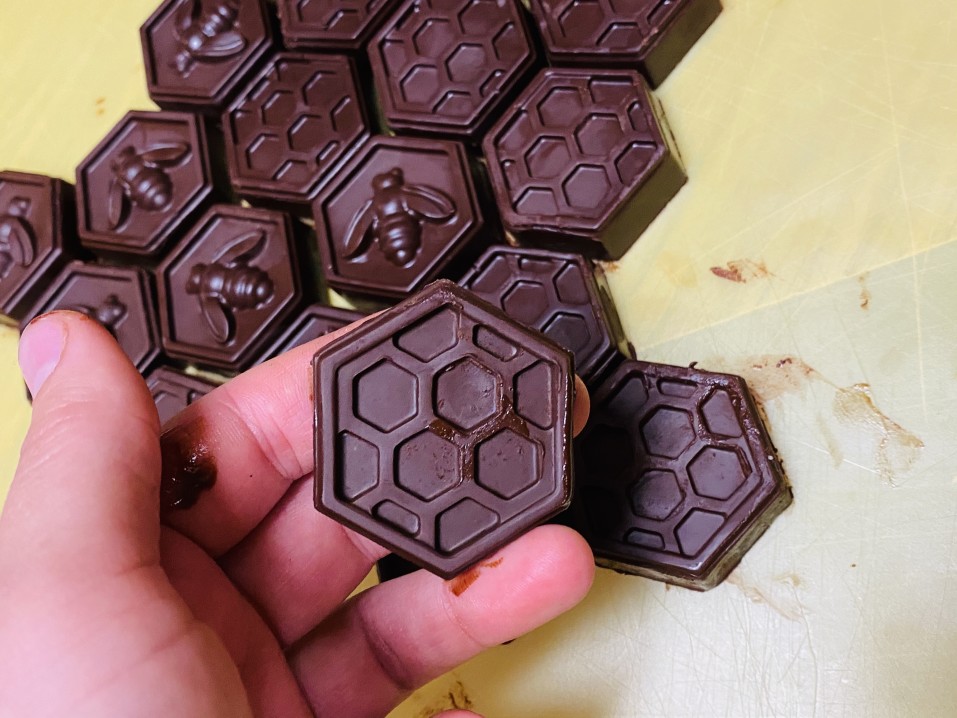 Delicious homemade 3D printed sugar free chocolates shaped as honeycomb