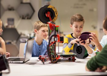 education, children, technology, science and people concept - group of happy kids with 3d printer at robotics school lesson