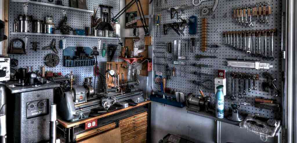 Machine room with benchtop metal lathe. photo credit: mtneer_man